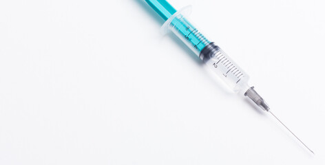 Fototapeta premium Disposable plastic syringe prepared for injection and vaccination in the hospital. The concept of medicine and health