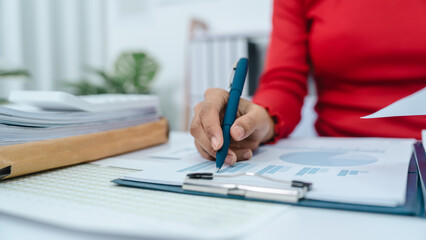 Personal bookkeeping for household expenses calculating with calculator.