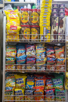 Various of Philippines snacks display on the rack for sell.