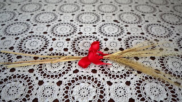 Still Life - Wheat Ears with Red Bow and Ancient Lace Tablecloth
