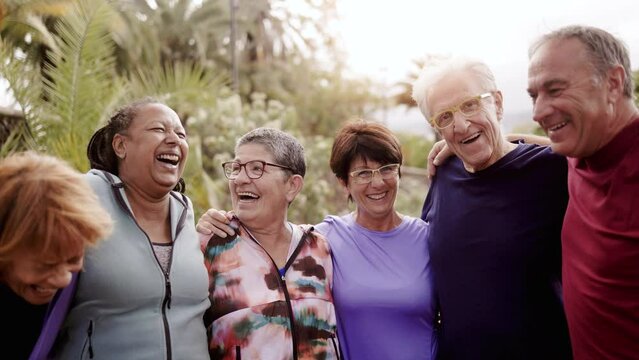 Senior people friends having fun together after exercise sport workout outdoors at park city - Joyful elderly friendship community