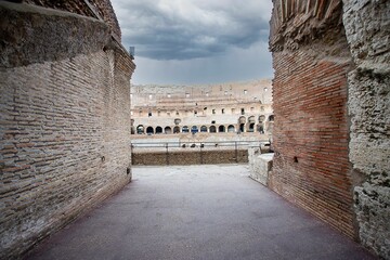Colosseum in Rome with dark clouds