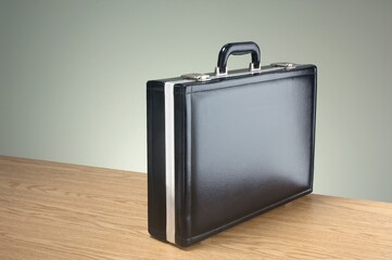 Close-up shot of a diplomat on a wooden table