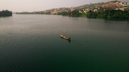 Aerial view of a boat on Volta River. Ghana, West Africa.