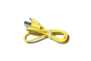 Naklejka premium yellow USB cable on white background. USB and USB-mini cable connectors close-up. A patch cable or patch cord or patch lead.