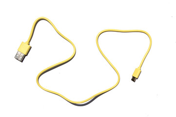 yellow USB cable on white background. USB and USB-mini cable connectors close-up. A patch cable or patch cord or patch lead. - Powered by Adobe
