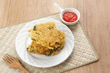 Martabak Mie, made from noodles mixed with eggs, leeks then fried. Indonesian food
