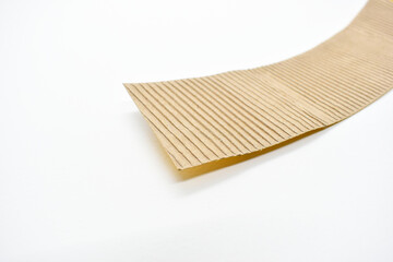 closeup brown paper cardboard texture on white background