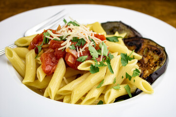 A freshly prepared dish of Pasta alla Norma.