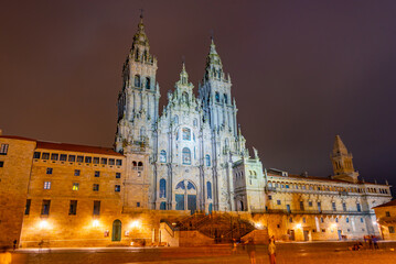 Night view of the Cathedral of Santiago de Compostela in Spain - obrazy, fototapety, plakaty