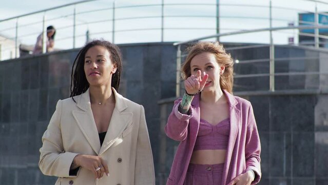 Young African american woman is meeting with a business partner or client and discussing future plans for a project, Portrait
