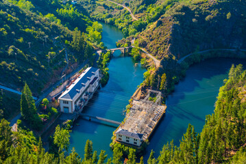Panorama of Navea river passing Pontenovo hydro power plant in Spain