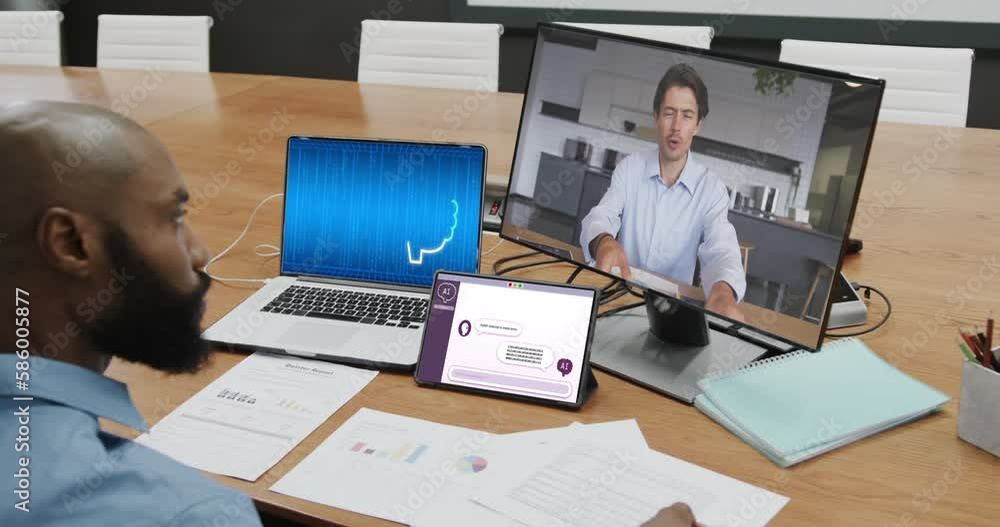 Poster african american businessman in office using computer with video call and data processing on screen
