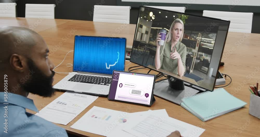 Poster african american businessman in office using computer with video call and data processing on screen
