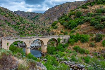 Barren valley surrounding confluence of Huebra and Camaces rivers in Spain