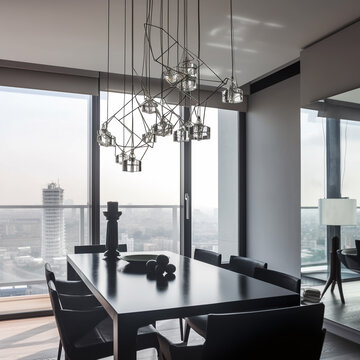 Editorial Style photo Eye-level Modern Dining Room Lighting Fixture Glass, Metal Minimal Decor Black, White, Gray Artemide Natural Light Milan Late Afternoon Sleek, Elegant Penthouse