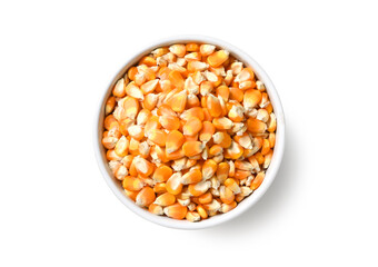 Top view of dried corn seeds in white bowl  isolated on white background. Clipping path.