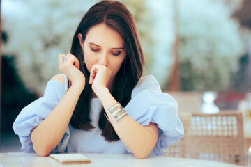 Woman Writing Down a List Planning an Event. Creative person trying to compose an idea plan before...