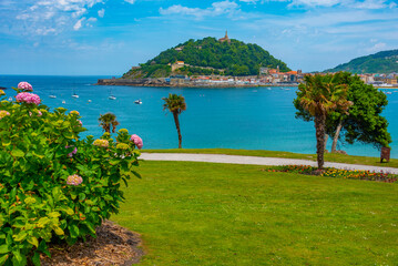 Fototapeta premium Santa Clara island viewed from Miramar palace in San Sebastian, Spain