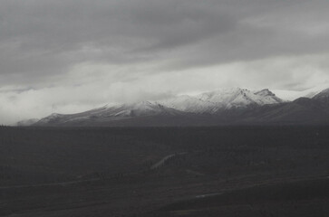 gloomy mountains in the fog and clouds