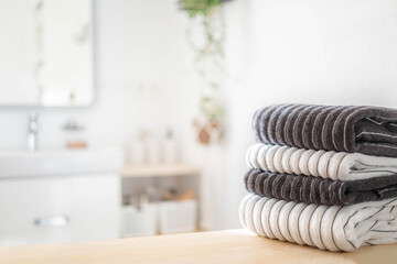 Bath fresh towels pile soft textile cotton body care neatly folded white gray laundry flower shelf....