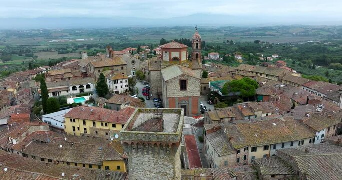 Medieval Village With Collegiata di San Michele Arcangelo Roman Catholic Church In The Province of Arezzo, Tuscany, Italy. Aerial Drone Shot