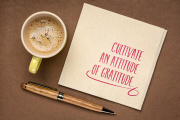 cultivate an attitude of  gratitude - inspirational handwriting on a napkin with a cup of coffee, positive mindset and personal development concept