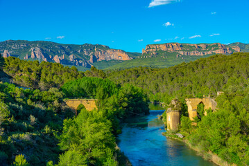 Ruins of a stone bridge over Rio Gallego in Spain