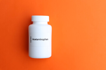 Acetaminophen pill in white bottle, pill stock