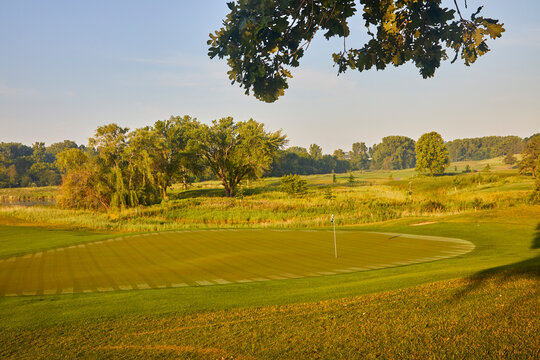 Golf course with perfect cut grass and greens on a lovely summer day near Minneapolis Minnesota USA