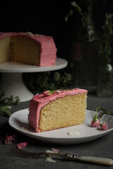 piece of cake with pink icing