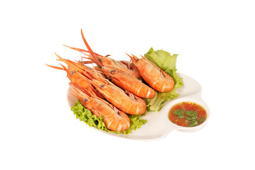 grilled shrimp on a plate served with spicy sauce