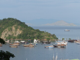 Fototapeta na wymiar Yachts, ships and boats in the port of Labuan Bajo, Indonesia