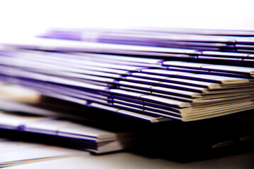 stack of books in office