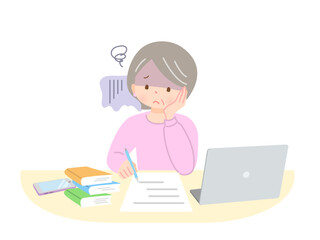 頬付を付きながら勉強する分な顔のシニア女性