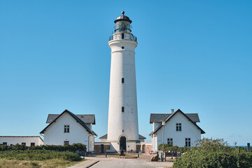 Fototapeta na wymiar White Lighthouse Hirtshals Fyr at danish coast. High quality photo