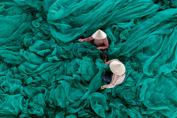 Sewing fishing net in Vietnam South Central coast