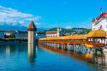 Kapellbruecke with Francis Xavier church at Swiss town Luzern