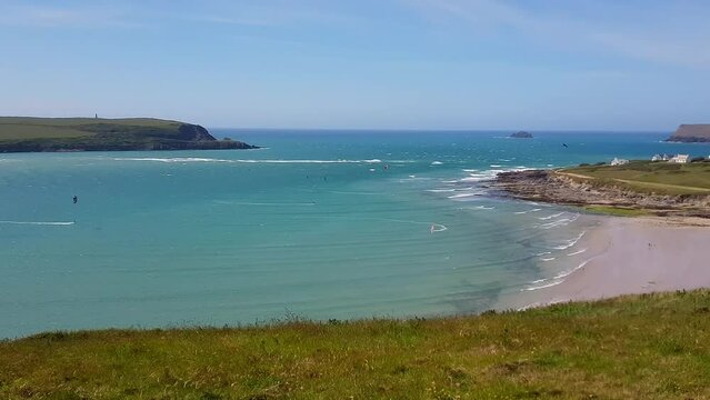 Sweeping pan shot of Daymer Bay and the River Camel Estuary, near Rock and Padstow Cornwall England UK
