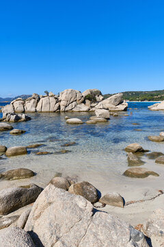 Tamaricciu beach, beautiful Mediterranean beach dotted with rocks along the entire coast, Porto Vecchio, Corsica, France
