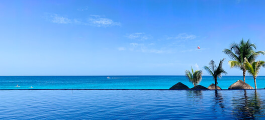Beach tourist resort swimming pool in caribbean sea