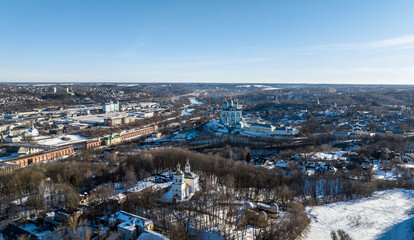 panoramic view from a drone of the historical part of Smolensk with a fortress wall and churches on a sunny winter day