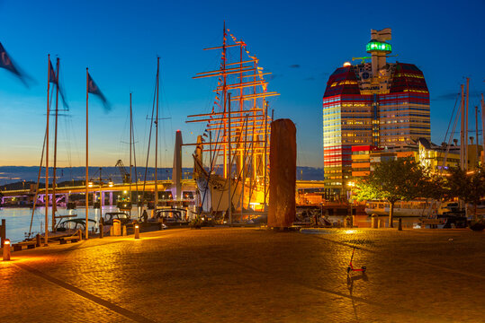 Sunset view of Lilla Bommen building and Barken Viking ship in the swedish city Goteborg.