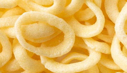 Onion ring chips as a background.