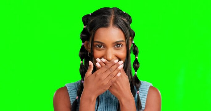 Woman, hands cover mouth and green screen studio with surprise, wow face and mind blown for mock up. Young indian student, amazed girl and gossip in mockup portrait for secret story by background