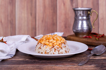 Dry bean pilaf. Prepared with the perfect harmony of dry beans and rice, this dish is both nutritious and satisfying. Traditional Turkish cuisine. Local name kuru fasulye pilav
