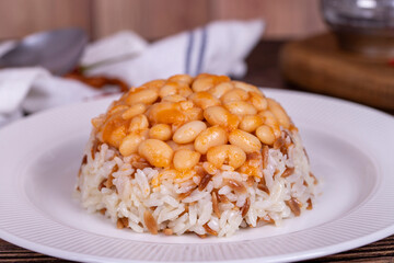 Dry bean pilaf. Prepared with the perfect harmony of dry beans and rice, this dish is both nutritious and satisfying. Traditional Turkish cuisine. Local name kuru fasulye pilav. Close up
