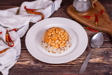 Dry bean pilaf. Prepared with the perfect harmony of dry beans and rice, this dish is both nutritious and satisfying. Traditional Turkish cuisine. Local name kuru fasulye pilav