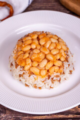 Dry bean pilaf. Prepared with the perfect harmony of dry beans and rice, this dish is both nutritious and satisfying. Traditional Turkish cuisine. Local name kuru fasulye pilav. Close up