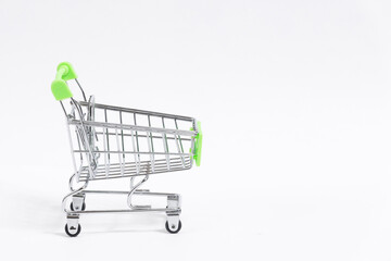 Shopping trolley cart isolated on white background, copy space.